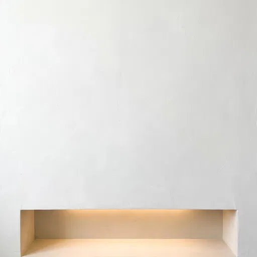 White Plaster Wall With Lit Niche