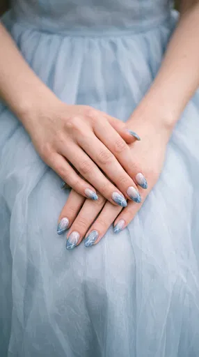 Hands With Blue Marble French Tip Nails