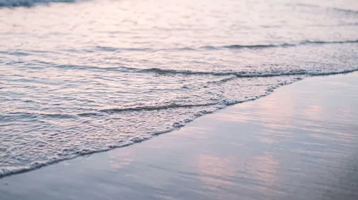 Pastel Ocean Ripples on Wet Sand
