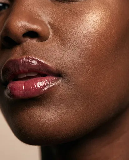 Macro Portrait of Glossy Berry Lips