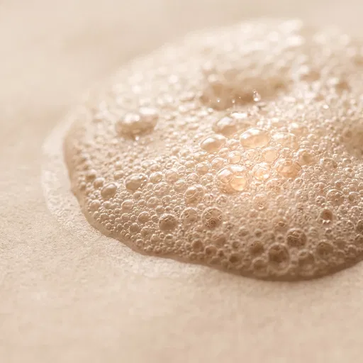 Macro View of Warm Beige Foam Bubbles