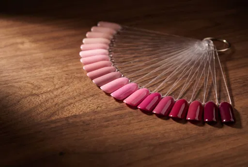 Pink Gel Nail Polish Swatches on Wood