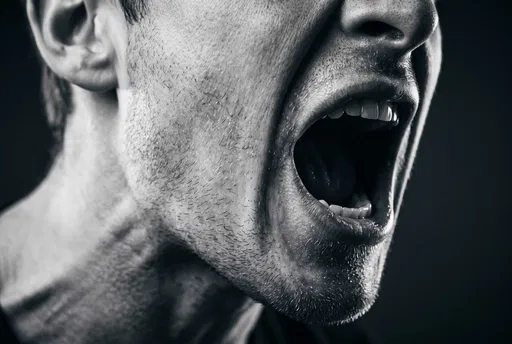 Close-Up of Man Shouting in Monochrome