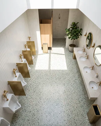 Modern Boutique Restroom With Terrazzo Floors