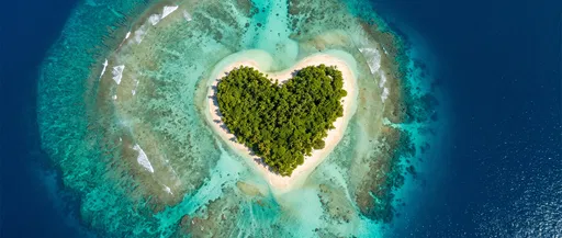 Aerial View of Heart Shaped Tropical Island