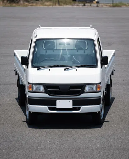 White Compact Cab-Over Pickup Truck Front View