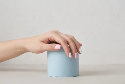 Hand With Pink and White Nails