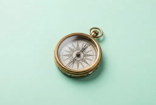 Vintage Brass Compass on Mint Background