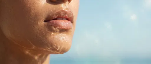 Macro Glossy Lips With Water Caustics