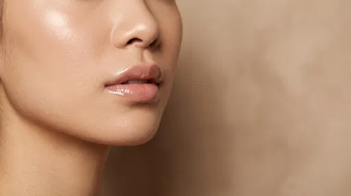 Close-Up of Glossy Lips and Skin