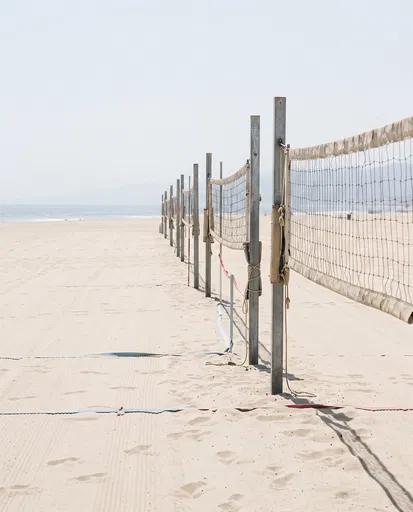 Row of Empty Beach Volleyball Nets
