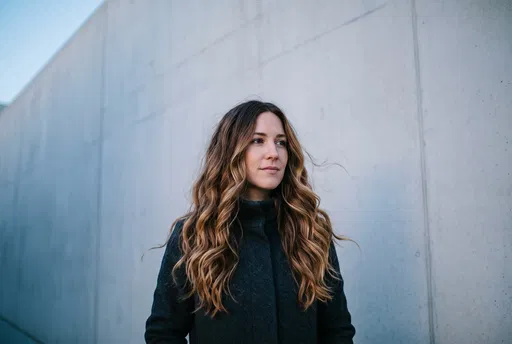 Woman With Wavy Balayage Hair Outdoors