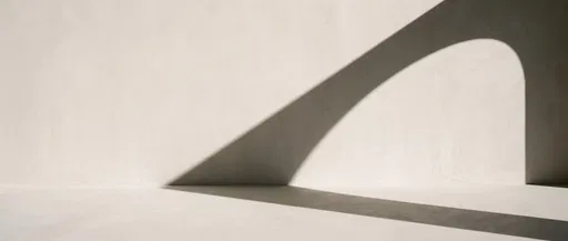 Minimalist Plaster Wall With Arch Shadow