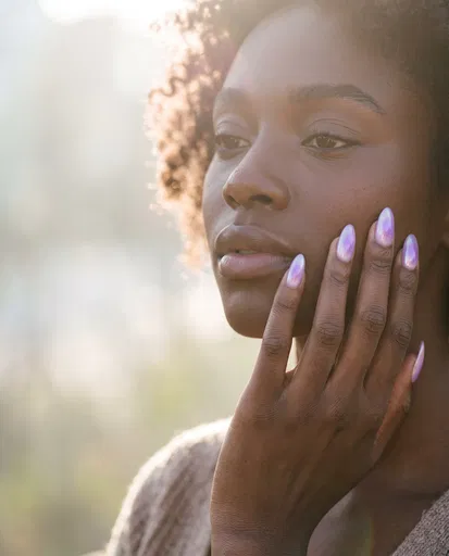 Woman Showing Iridescent Lilac Manicure