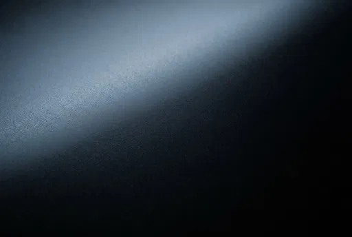 Matte Black Textured Surface With Blue Gradient