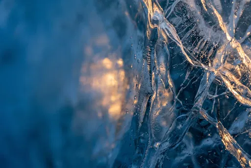Macro Blue Glacial Ice With Golden Light