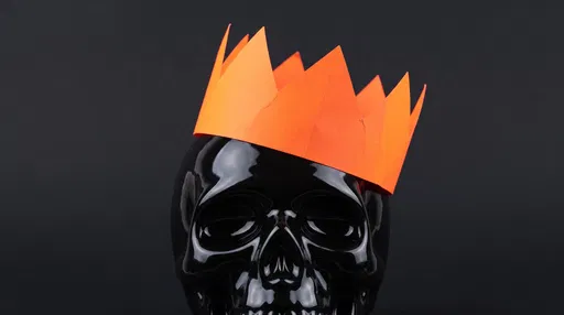 Black Ceramic Skull With Orange Crown