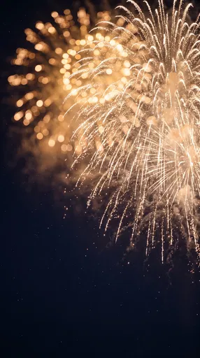 Golden Fireworks Burst in Starry Night Sky