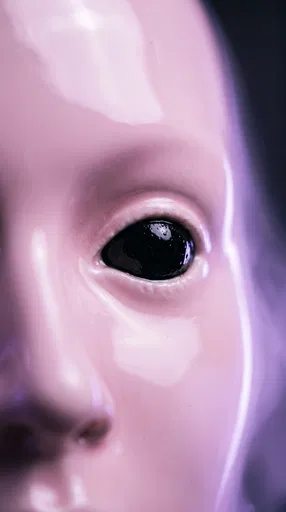 Glossy Pink Porcelain Face With Black Eye