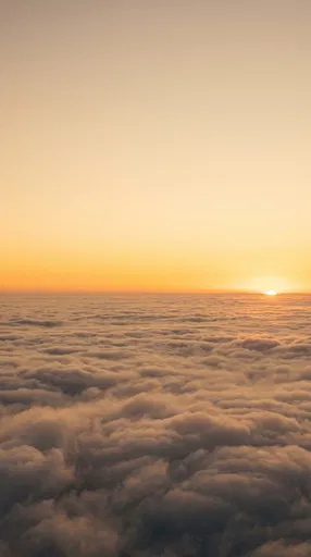 Golden Hour Sunset Above the Clouds