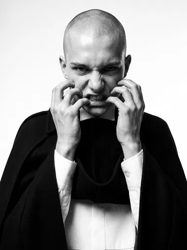 Monochrome Editorial Portrait of Grimacing Youth