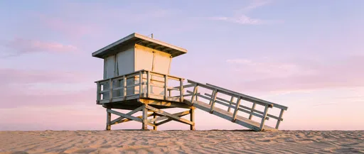Wooden Lifeguard Tower at Pastel Sunset