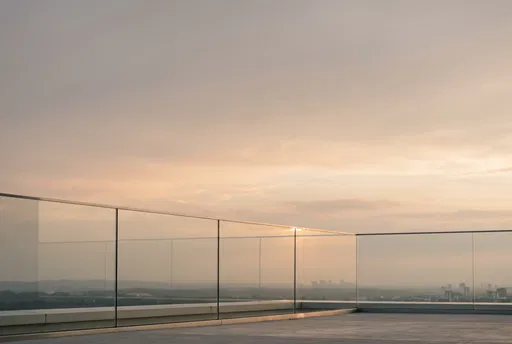 Minimalist Glass Rooftop Balustrade at Sunset