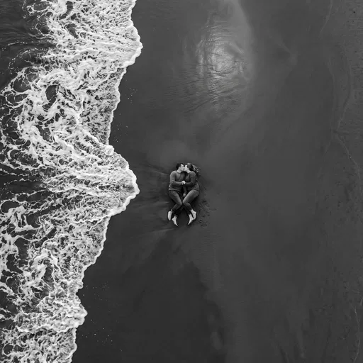 Aerial Monochrome Shot of Couple on Beach