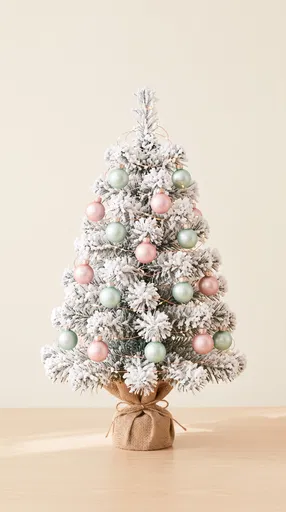 Flocked Tabletop Christmas Tree with Pastel Ornaments