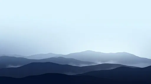 Minimalist Blue Misty Mountain Ridges Background