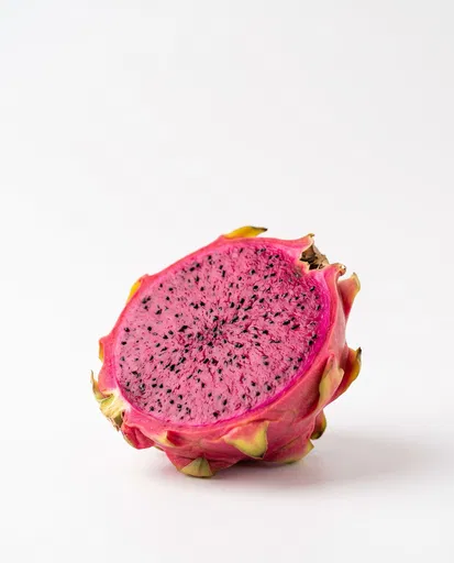 Halved Pink Dragon Fruit on White