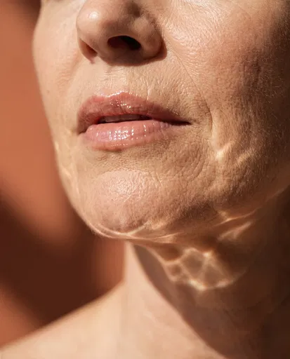 Macro Portrait of Mature Woman With Glossy Lips