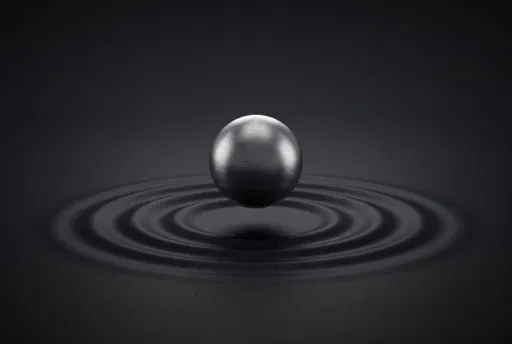 Brushed Metal Sphere Over Black Ripples