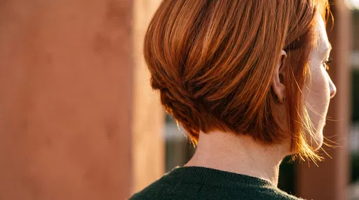 Copper Red Graduated Bob Haircut in Sunlight