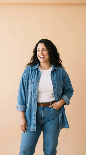 Smiling Woman in Denim Studio Portrait