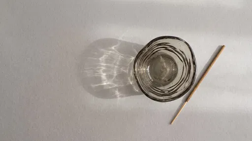 Smoke Glass Vessel and Incense Flatlay