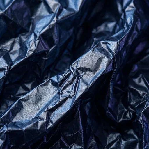 Crumpled Dark Blue Metallic Foil Texture