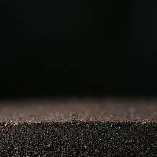Macro Dark Espresso and Volcanic Silt Surface