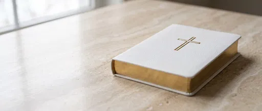 White Leather Bible on Marble Table