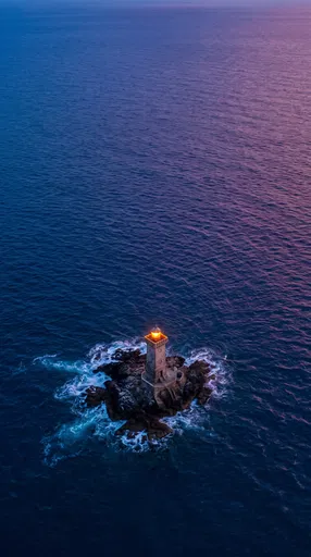 Aerial View of Solitary Ocean Lighthouse