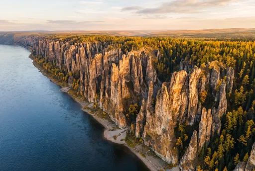 Lena Pillars Along River at Golden Hour