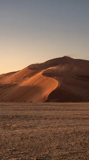 Terracotta Desert Dunes At Sunset
