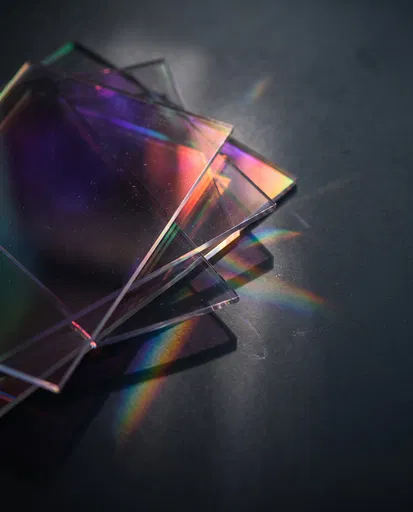 Iridescent Acrylic Sheets Casting Rainbow Caustics
