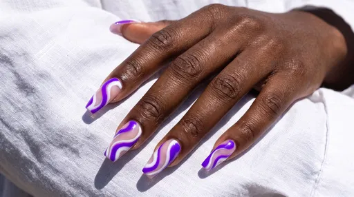 Purple and White Swirl Nail Art