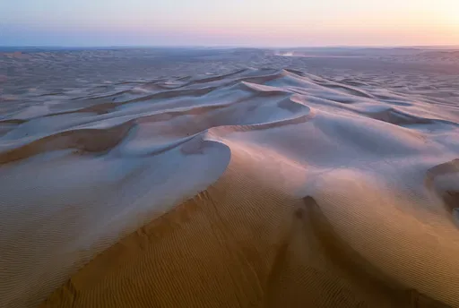 Sweeping Sand Dunes at Twilight