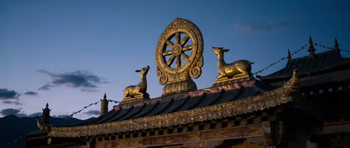 Golden Dharmachakra and Deer on Monastery Roof