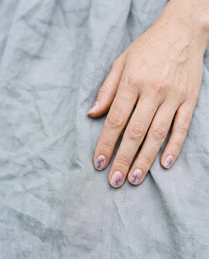 Hand With Lavender Watercolor Nail Art