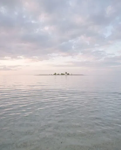 Distant Tropical Sandbar Island at Dawn
