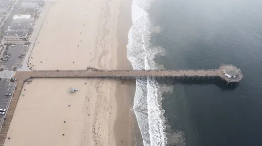 Aerial View of Foggy Coastal Pier