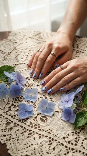 Hands With Blue Porcelain Floral Nail Art